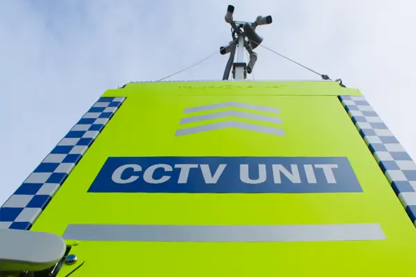 Mobile CCTV tower providing 24-7 monitored security coverage on a construction site.