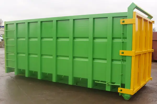 40 yard roll on roll off skip positioned on a construction site ready for loading bulk waste materials.